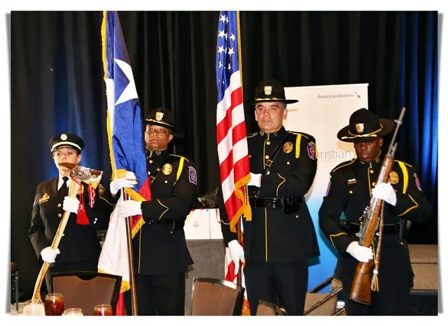 men and women in uniform holding rifle and flags 2