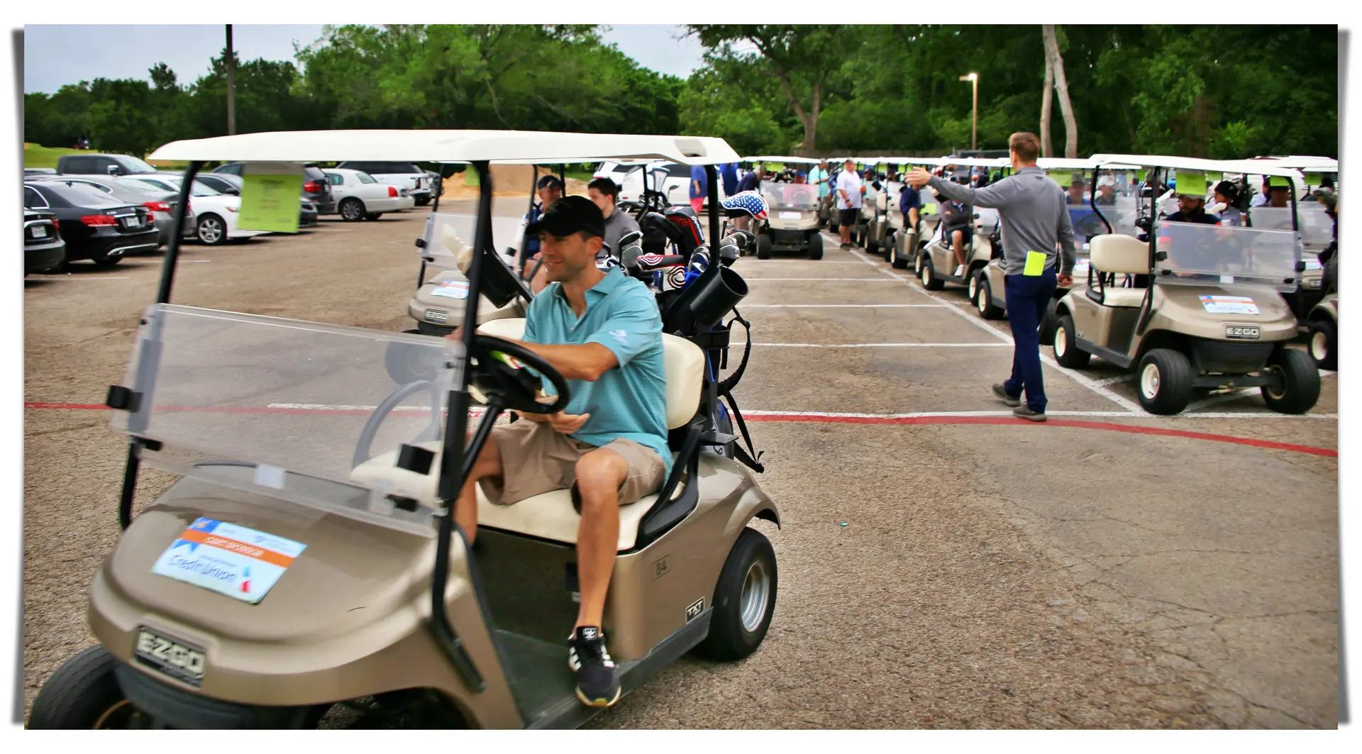 closeup of people riding in golf carts